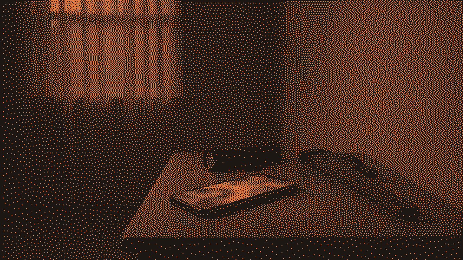 A phone glows orange on a nightstand beside a flashlight and a red pipe wrench in a dark bedroom at night.