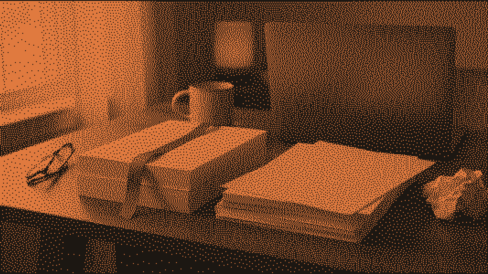 Two stacks of blank paper on a wooden desk, the kept stack marked with an orange ribbon and the other pushed aside with one crumpled sheet, reading glasses and a closed laptop nearby in morning light.